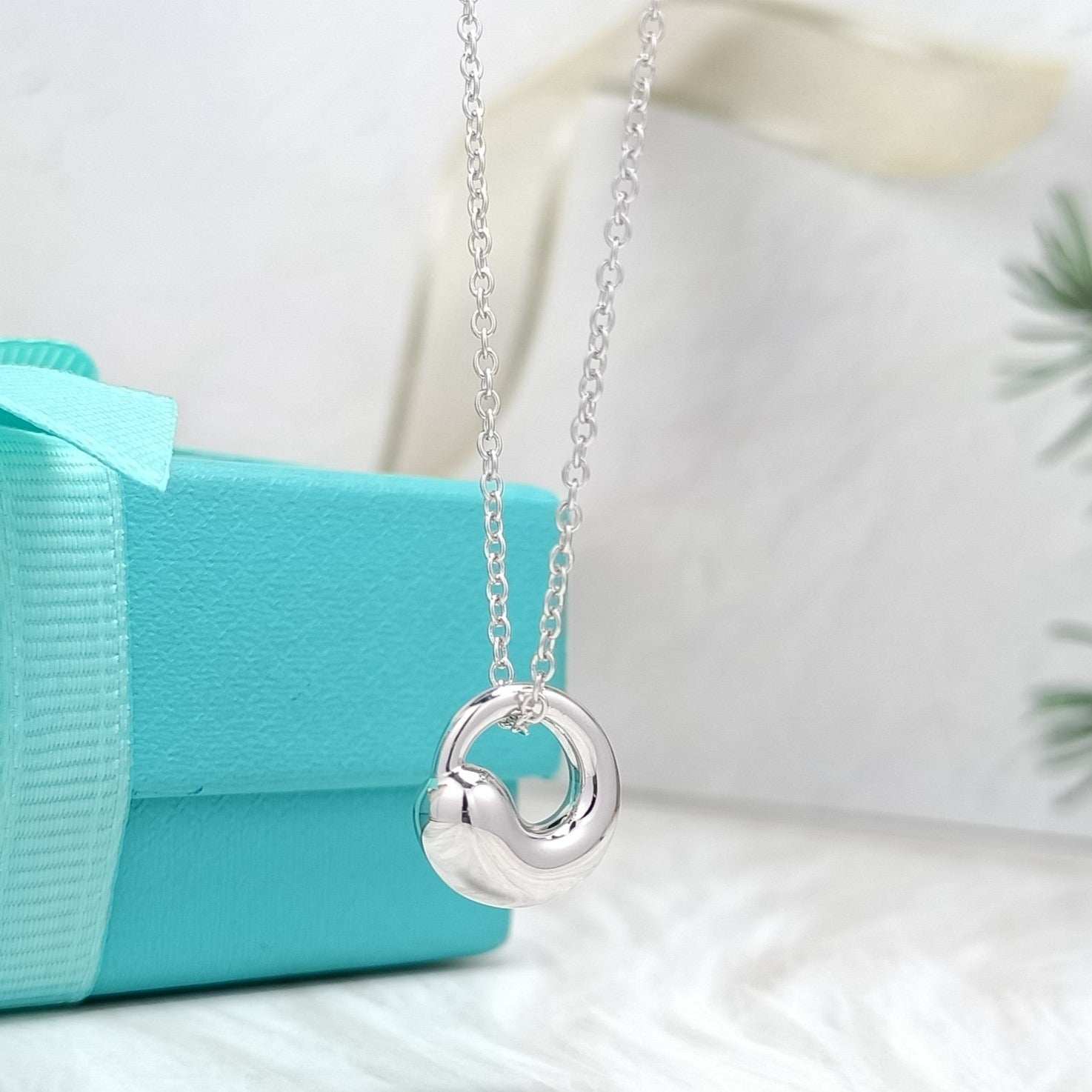 TIFFANY & CO. SNAIL PEDANT SILVER NECKLACE