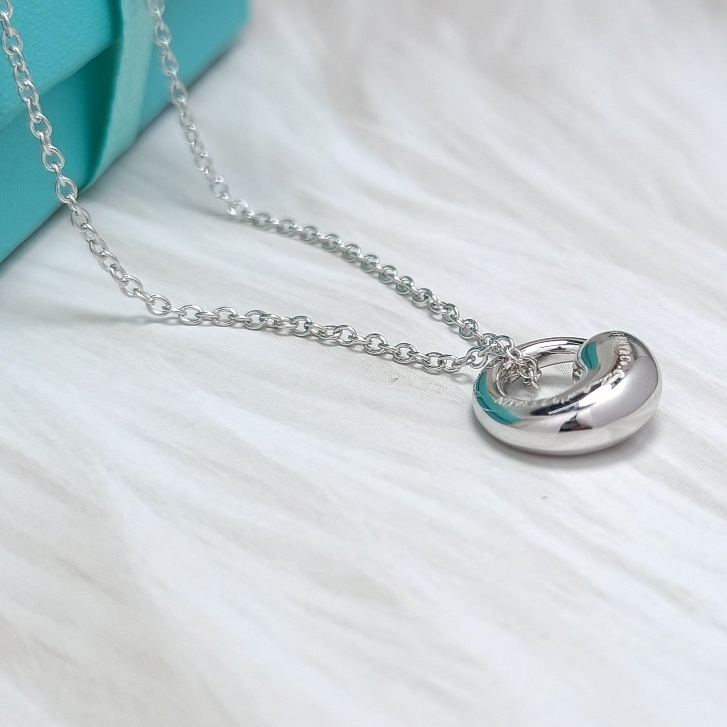 TIFFANY & CO. SNAIL PEDANT SILVER NECKLACE