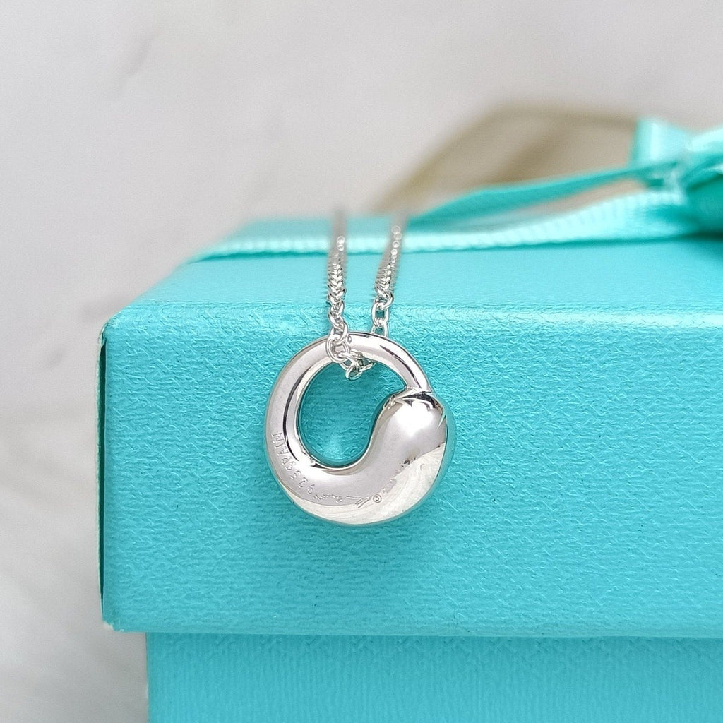 TIFFANY & CO. SNAIL PEDANT SILVER NECKLACE