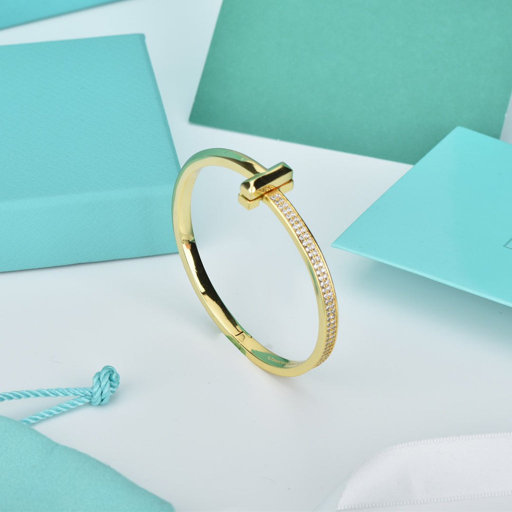 TIFFANY & CO. WIDE DIAMONDS HINGED BANGLE