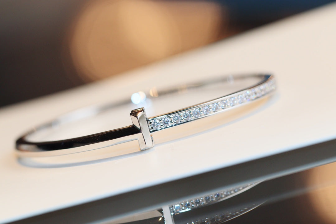 TIFFANY & CO. NARROW T1 HINGED BANGLE DIAMOND SILVER