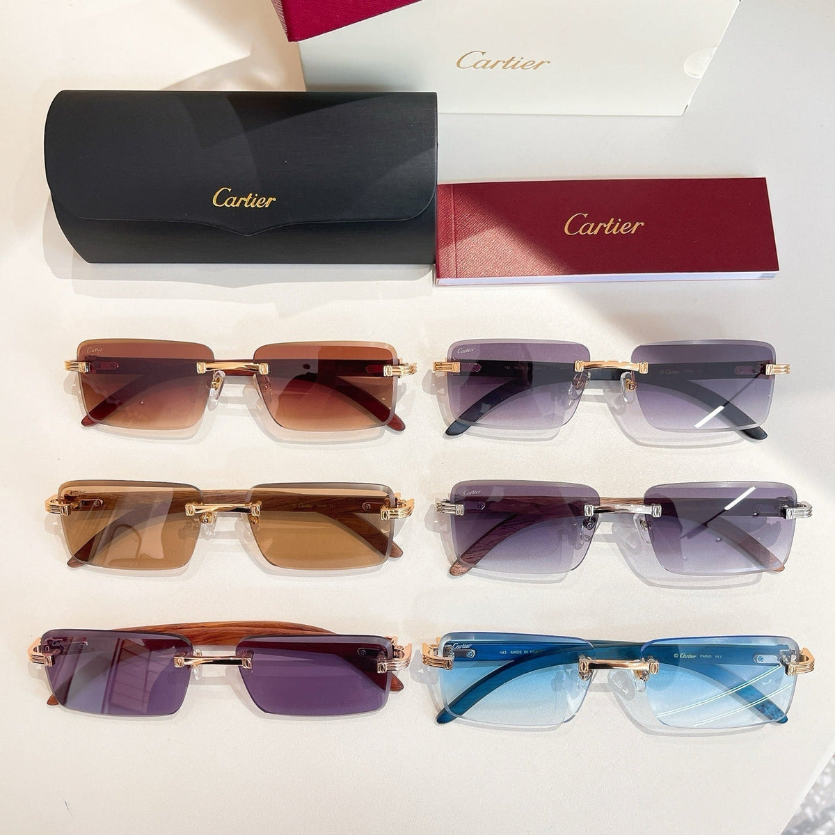 CARTIER C DE RIMLESS RECTANGULAR FRAME SUNGLASSES CT0619S IN METAL AND WOODEN