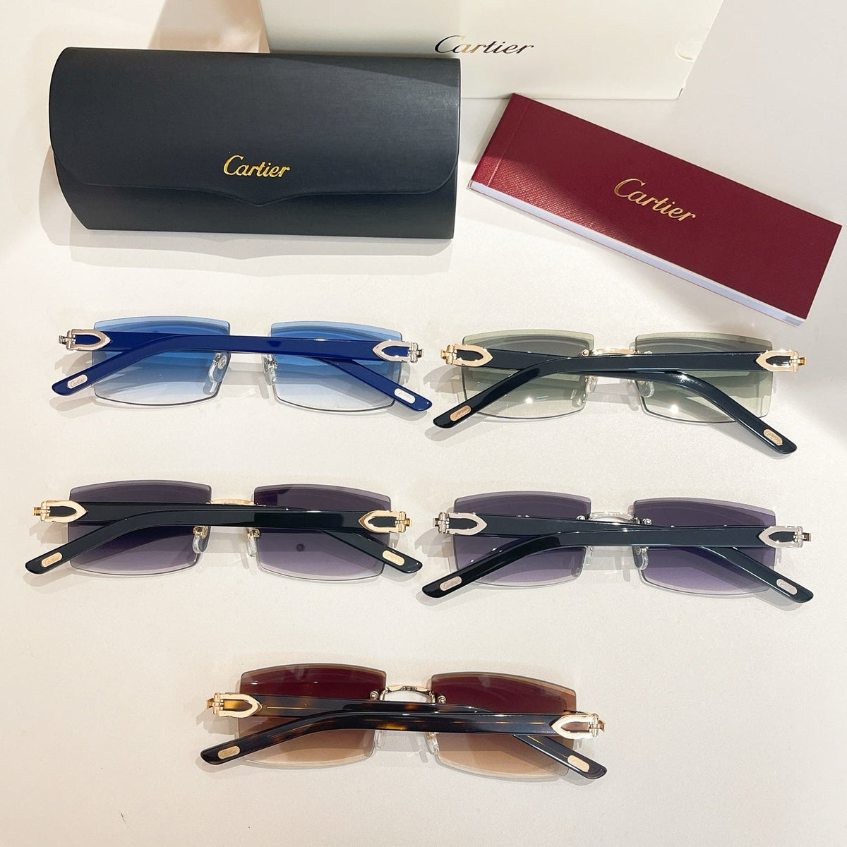 CARTIER C DE RIMLESS RECTANGULAR FRAME SUNGLASSES  571828 IN METAL