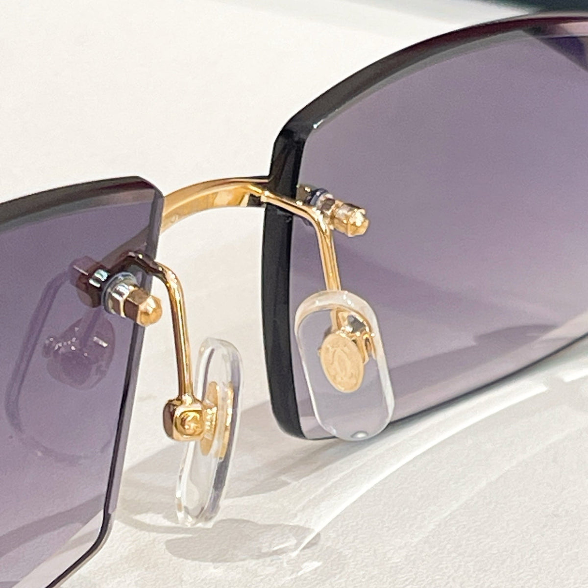 CARTIER C DE RIMLESS RECTANGULAR FRAME SUNGLASSES  571828 IN METAL