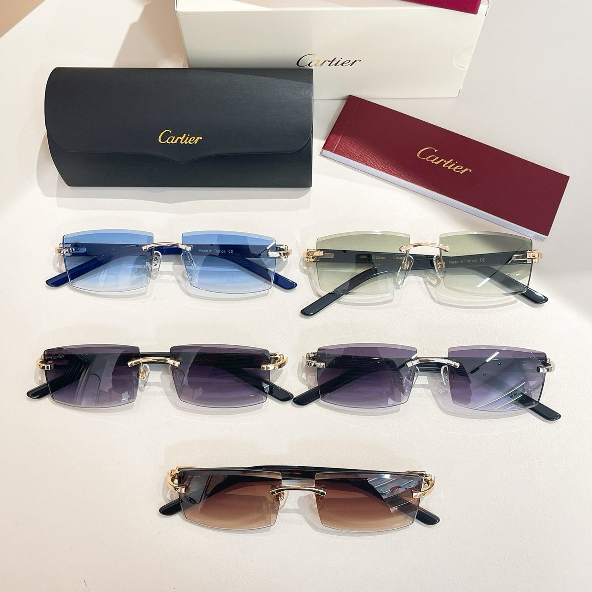 CARTIER C DE RIMLESS RECTANGULAR FRAME SUNGLASSES  571828 IN METAL