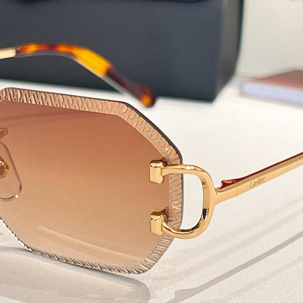 CARTIER C DE RIMLESS GEOMETRIC FRAME SUNGLASSES CT0092O IN METAL