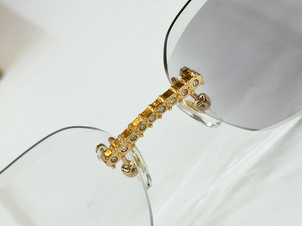 CARTIER CRYSTAL STUDDED RIMLESS SQUARE FRAME SUNGLASSES CT0603S IN METAL PHOTOCHROMIC LENSES