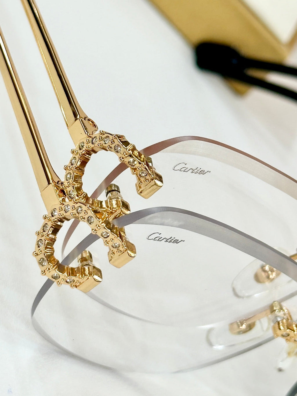 CARTIER CRYSTAL STUDDED RIMLESS SQUARE FRAME SUNGLASSES CT0603S IN METAL PHOTOCHROMIC LENSES
