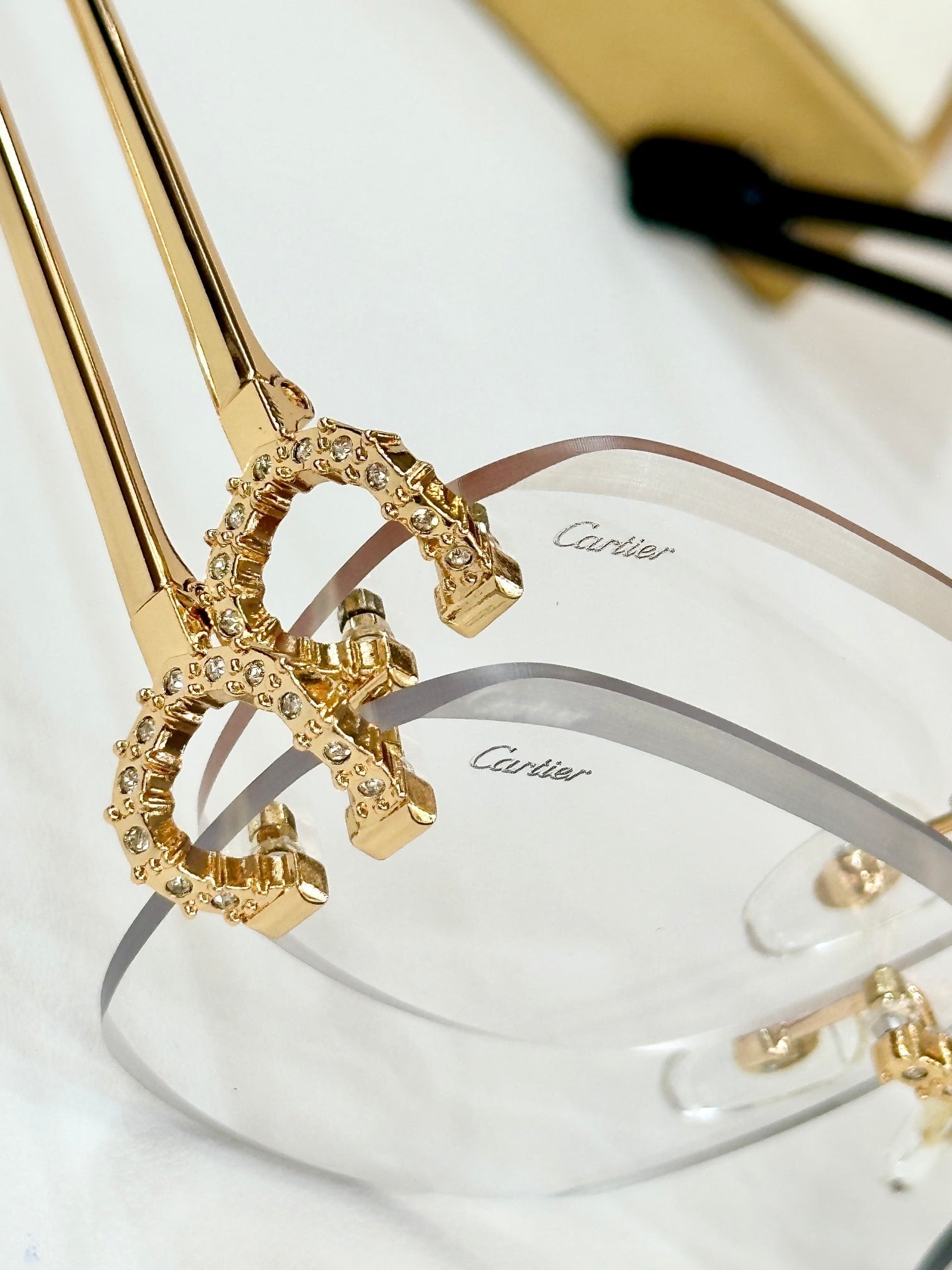 CARTIER CRYSTAL STUDDED RIMLESS SQUARE FRAME SUNGLASSES CT0603S IN METAL PHOTOCHROMIC LENSES